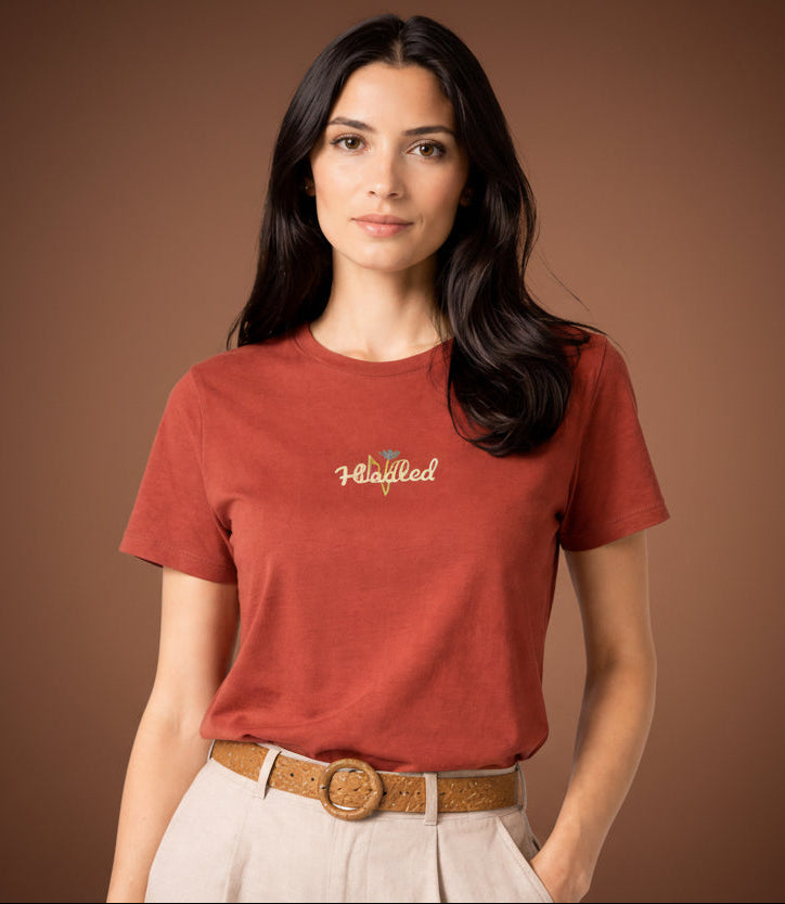 Close-up of the model wearing HEALED t-shirt